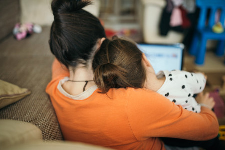 Mom and daughter looking at laptop." by shixart1985 is licensed with CC BY 2.0.